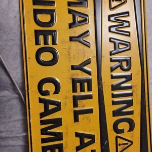 Yellow Video Game Warning Sign